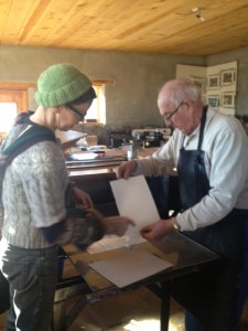 Jim Lorenz putting the paper down