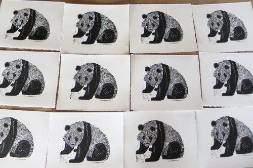 table_of_panda_linocuts
