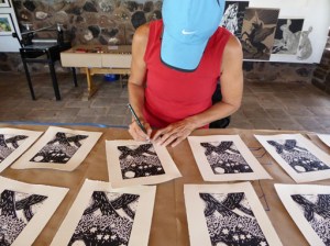 Michelle Holland signing her prints