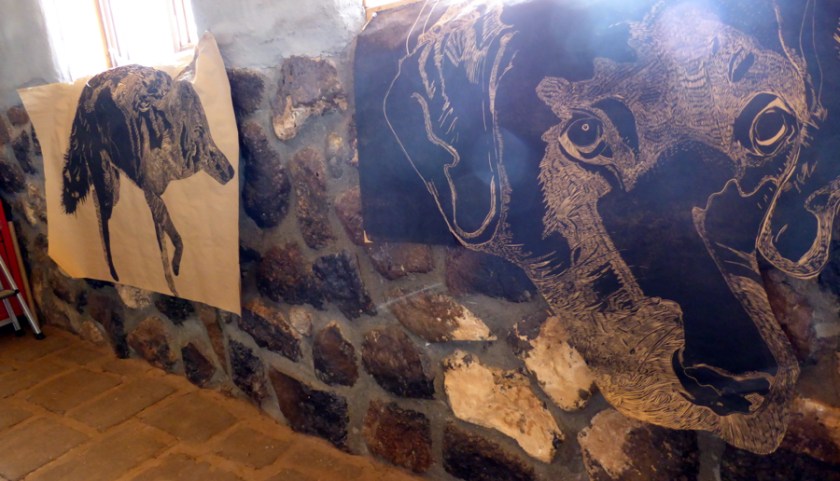 A giant proof print of Homie and Coyote